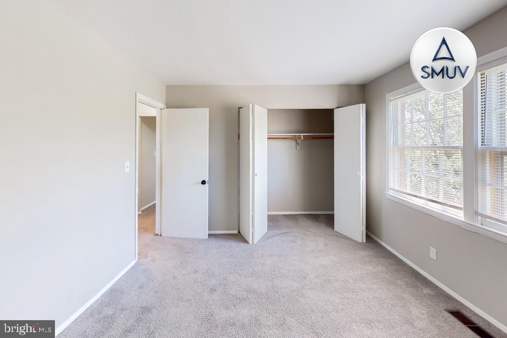 1504 Upshire Road, Unit F2 Baltimore, MD 21218 - Photo 18 of 22 a view of empty room with window