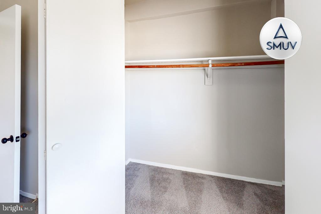 1504 Upshire Road, Unit F2 Baltimore, MD 21218 - Photo 21 of 22 a view of a hallway with a closet