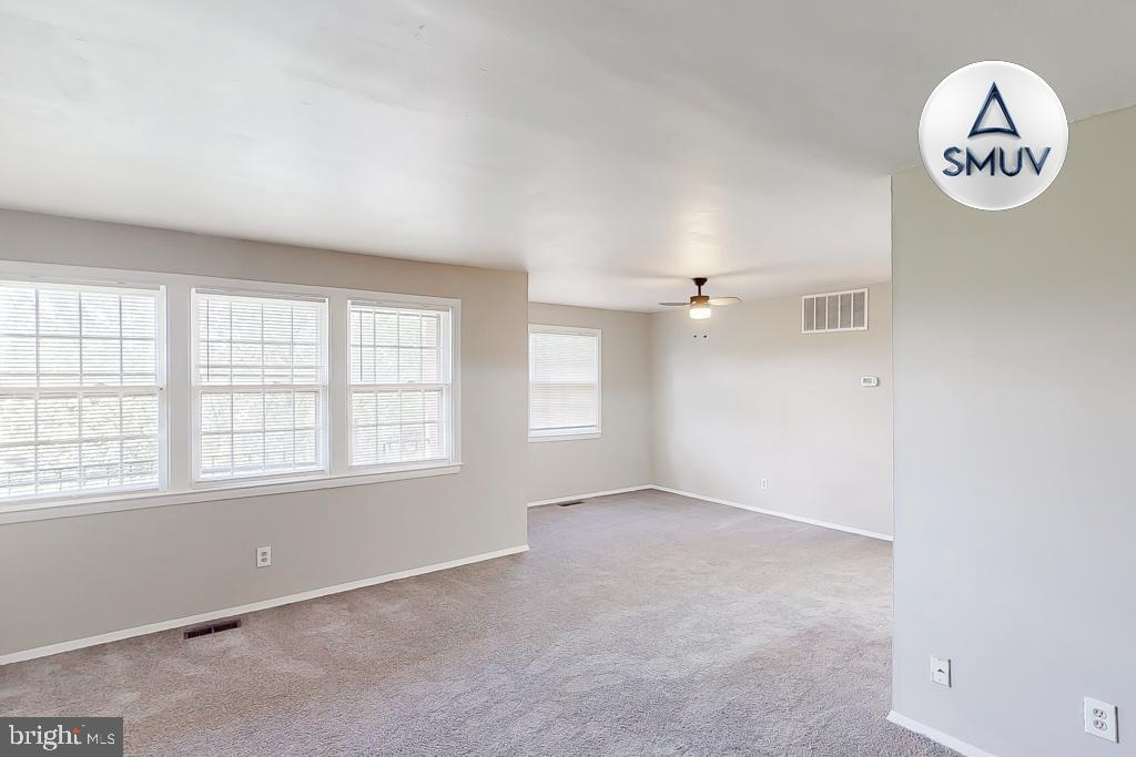 1504 Upshire Road, Unit F2 Baltimore, MD 21218 - Photo 3 of 22 an empty room with a window