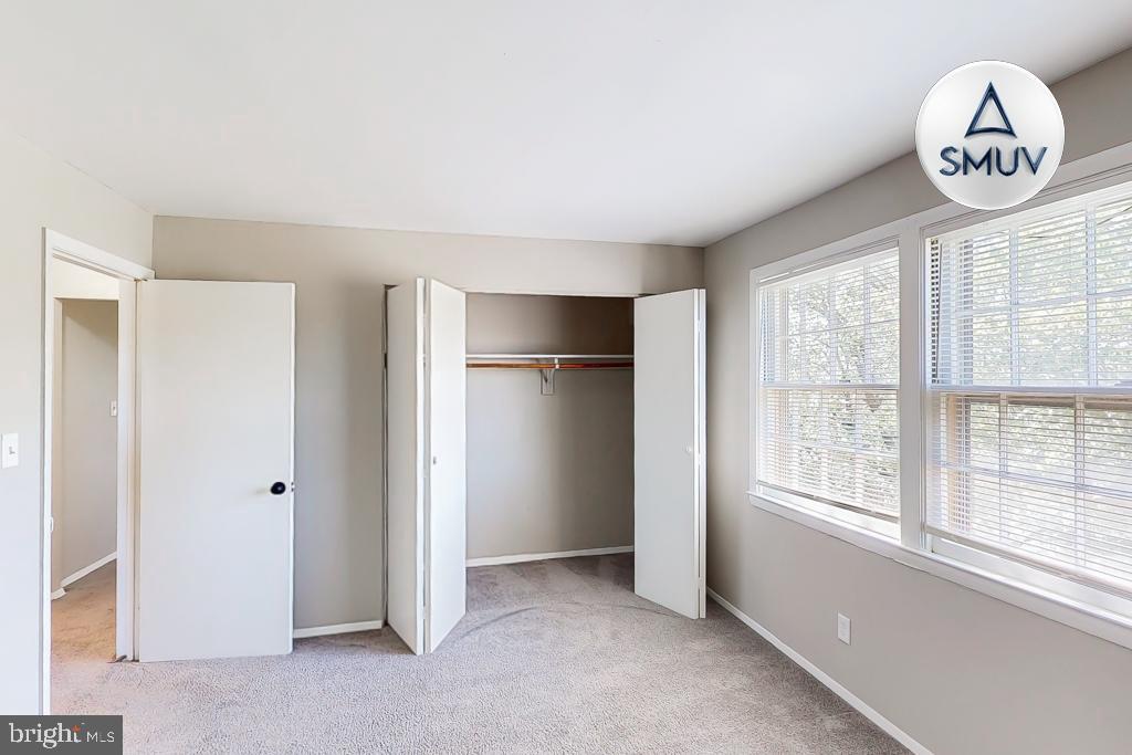 1504 Upshire Road, Unit F2 Baltimore, MD 21218 - Photo 9 of 22 a view of a livingroom with a large window