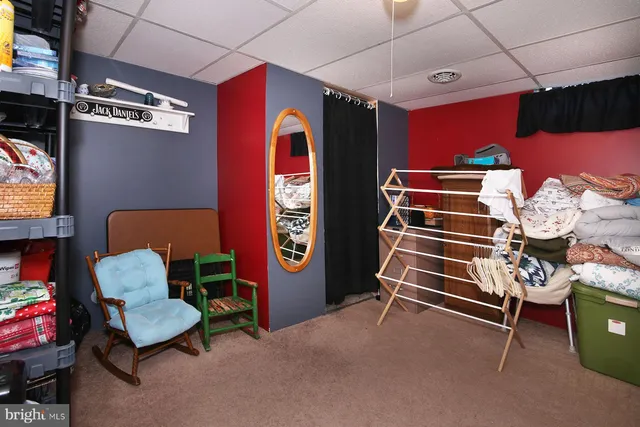 a bed room with a bed and a couch