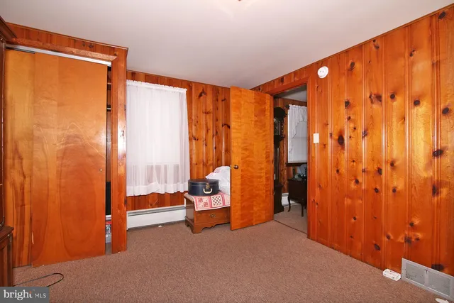 a bathroom with a toilet and a sink