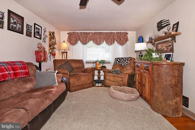 a living room with furniture and a couch