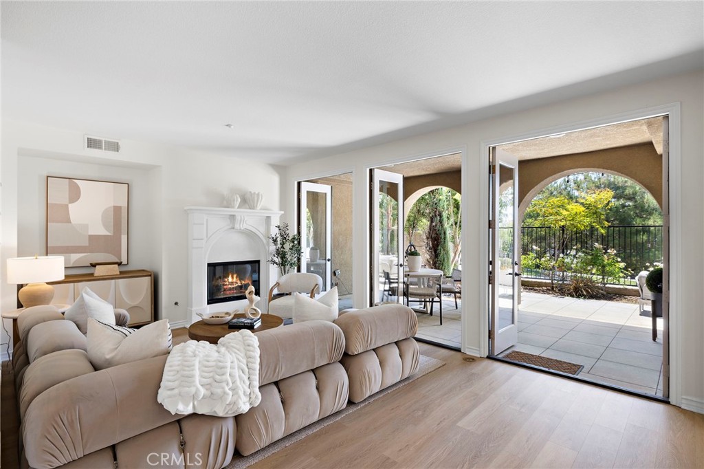 47 Tuscany Ladera Ranch, CA 92694 - Photo 3 of 28 a living room with furniture and a large window