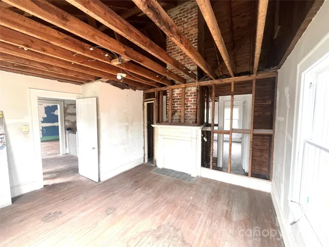 a view of a room with a fireplace