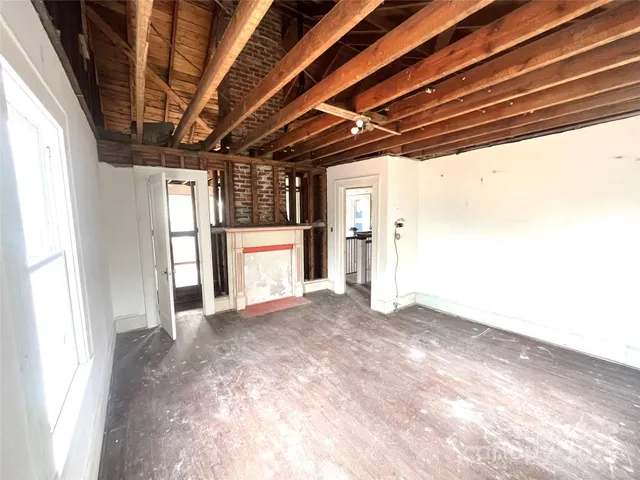 a view of walk in closet and natural light