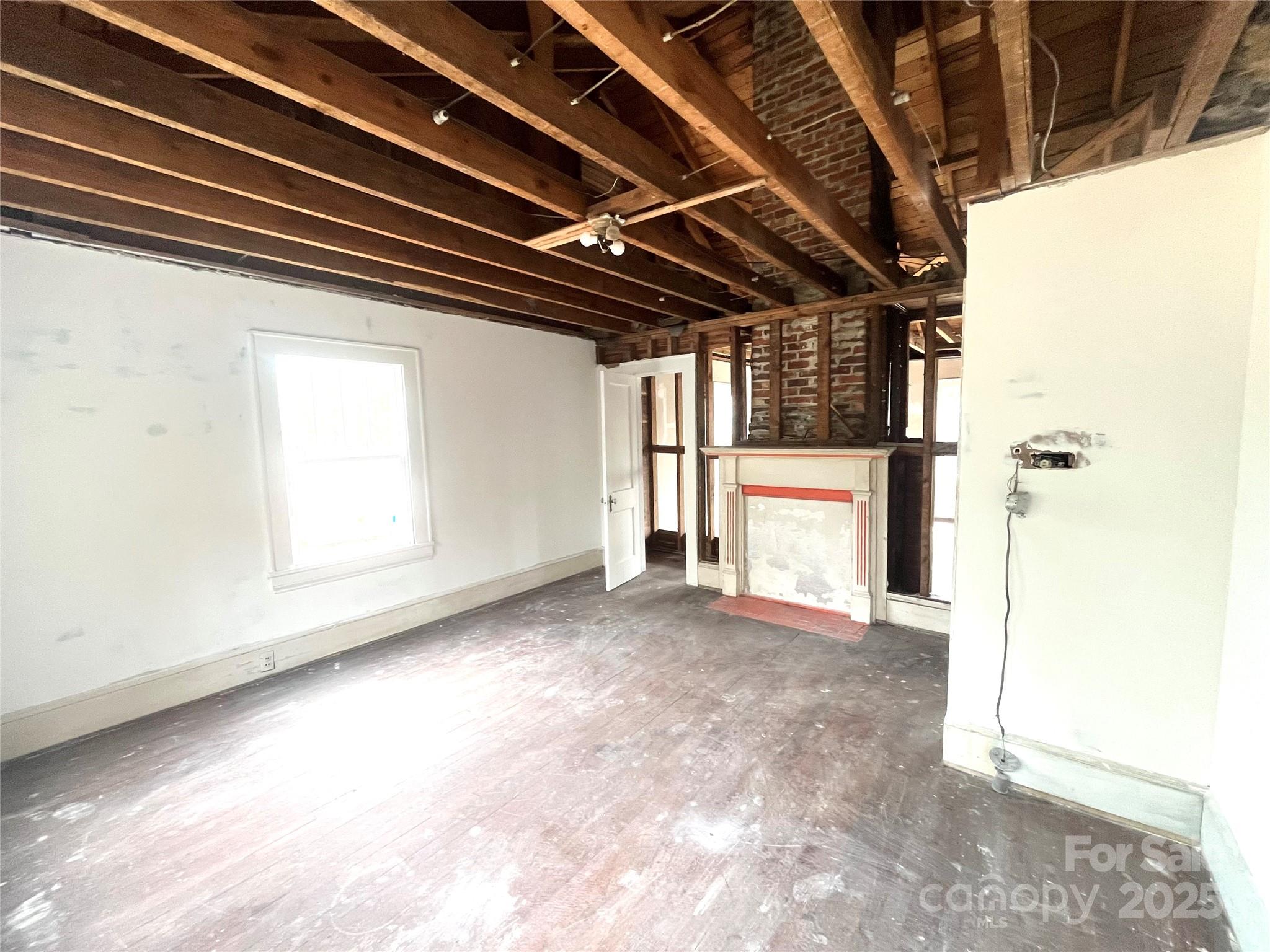 308 Elm Street Lancaster, SC 29720 - Photo 14 of 33 a view of a room with a fireplace