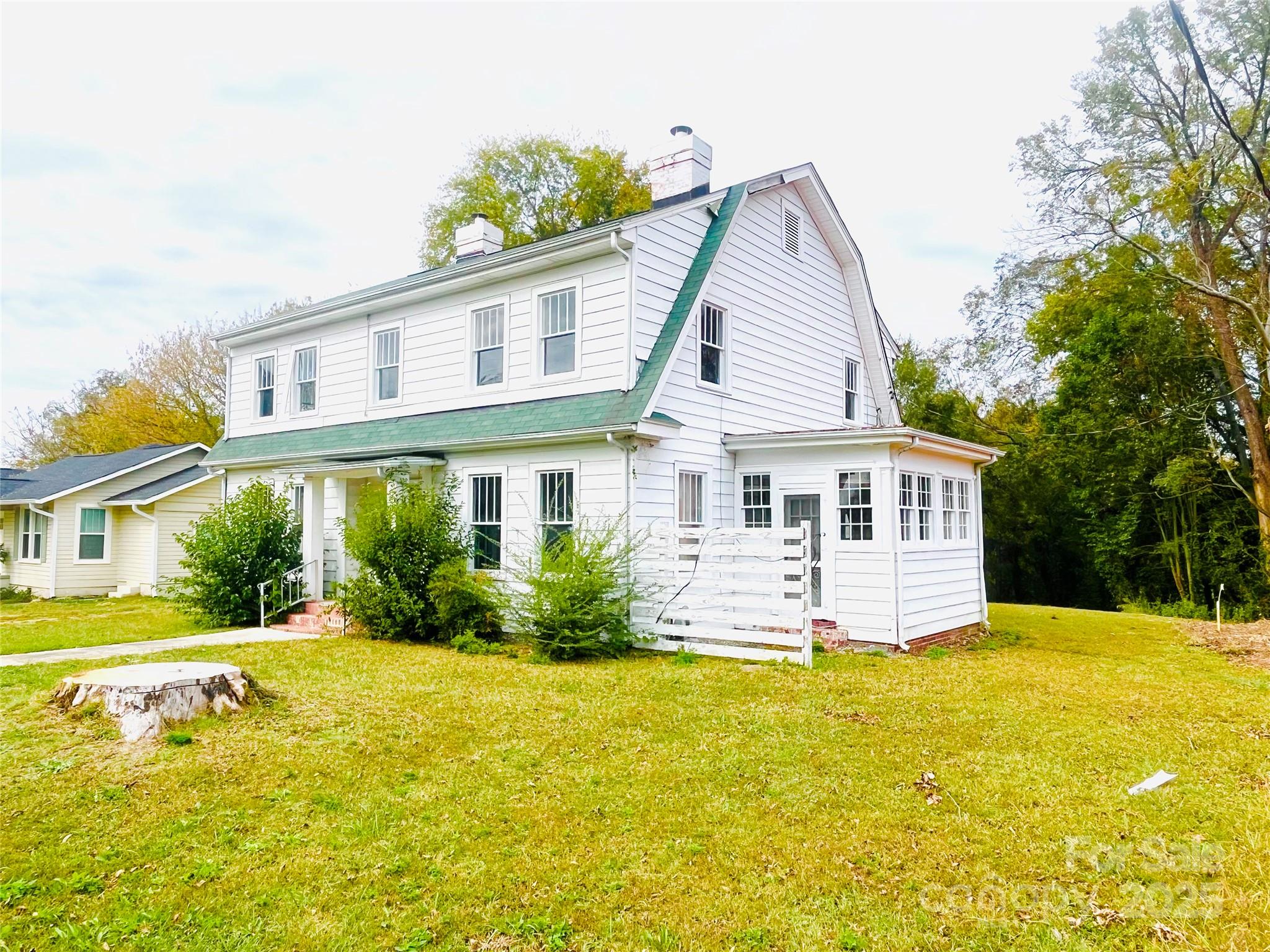 308 Elm Street Lancaster, SC 29720 - Photo 19 of 33 a front view of house with yard and swimming pool