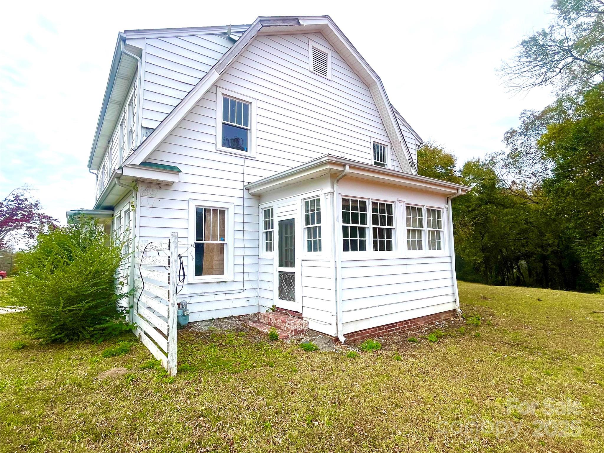308 Elm Street Lancaster, SC 29720 - Photo 20 of 33 a front view of a house with a yard