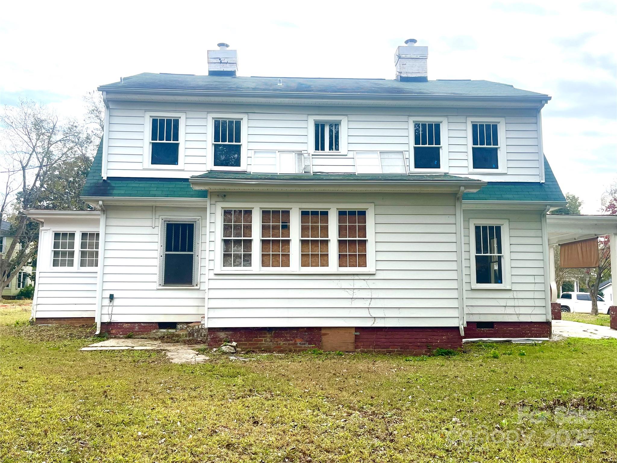 308 Elm Street Lancaster, SC 29720 - Photo 22 of 33 a front view of a house with a yard