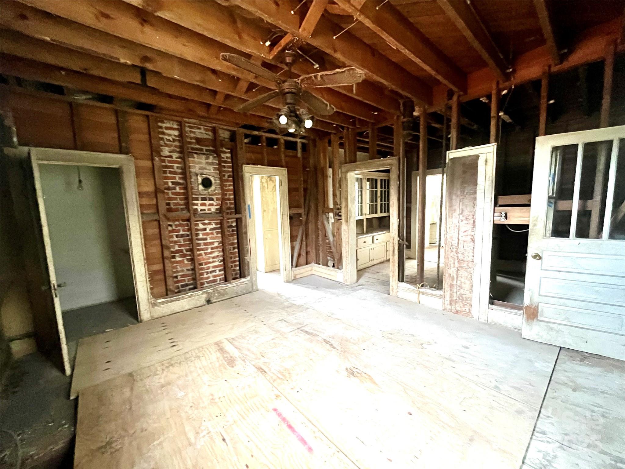 308 Elm Street Lancaster, SC 29720 - Photo 8 of 33 a view of an empty room with stairs