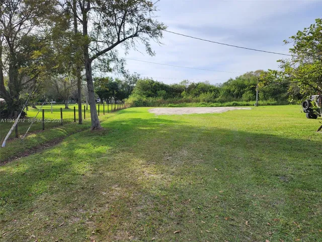a view of field with green space