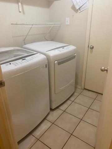 2217 Teddy Roosevelt Drive McKinney, TX 75072 - Photo 5 of 10 a utility room with dryer and washer