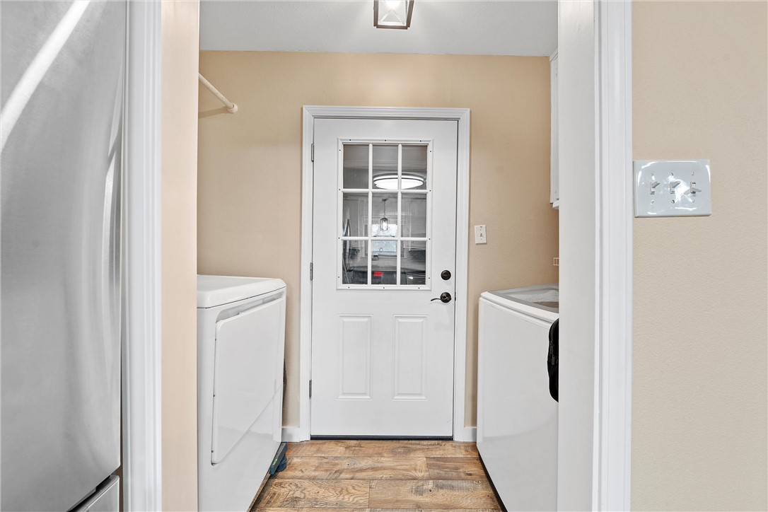 220 Ivy Lane Hewitt, TX 76643 - Photo 16 of 29 a view of a hallway with a wooden door