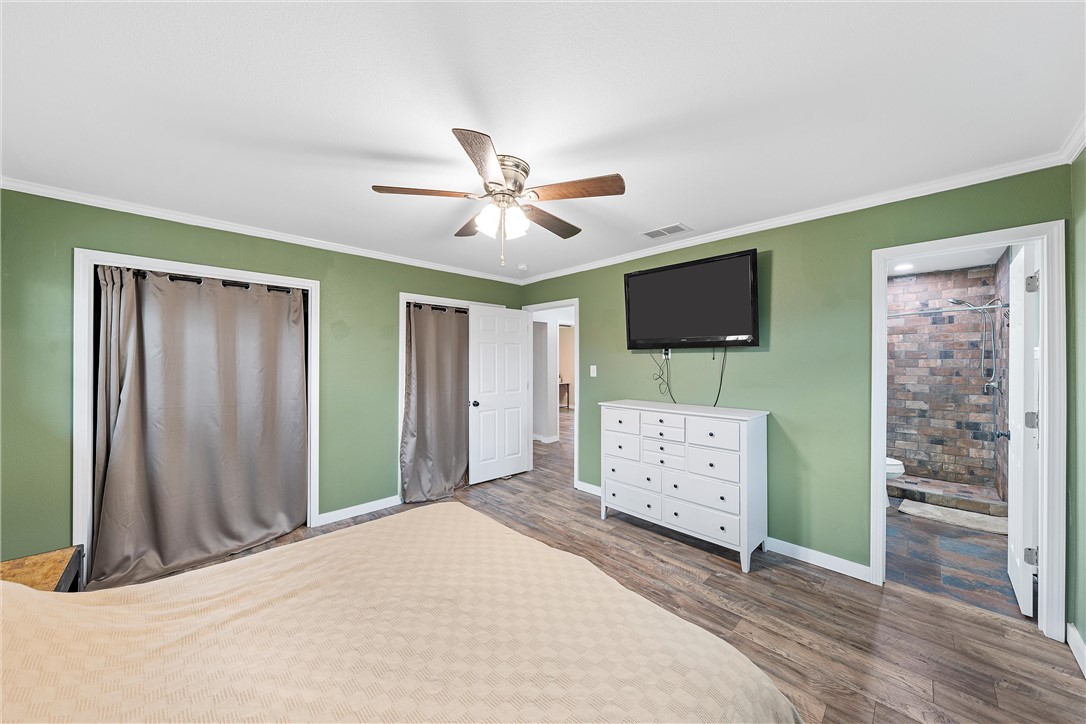 220 Ivy Lane Hewitt, TX 76643 - Photo 18 of 29 a view of a livingroom with furniture and a flat screen tv