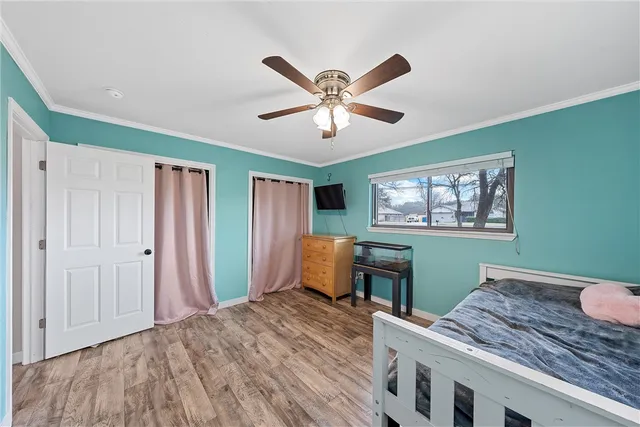 a bedroom with a bed and a table