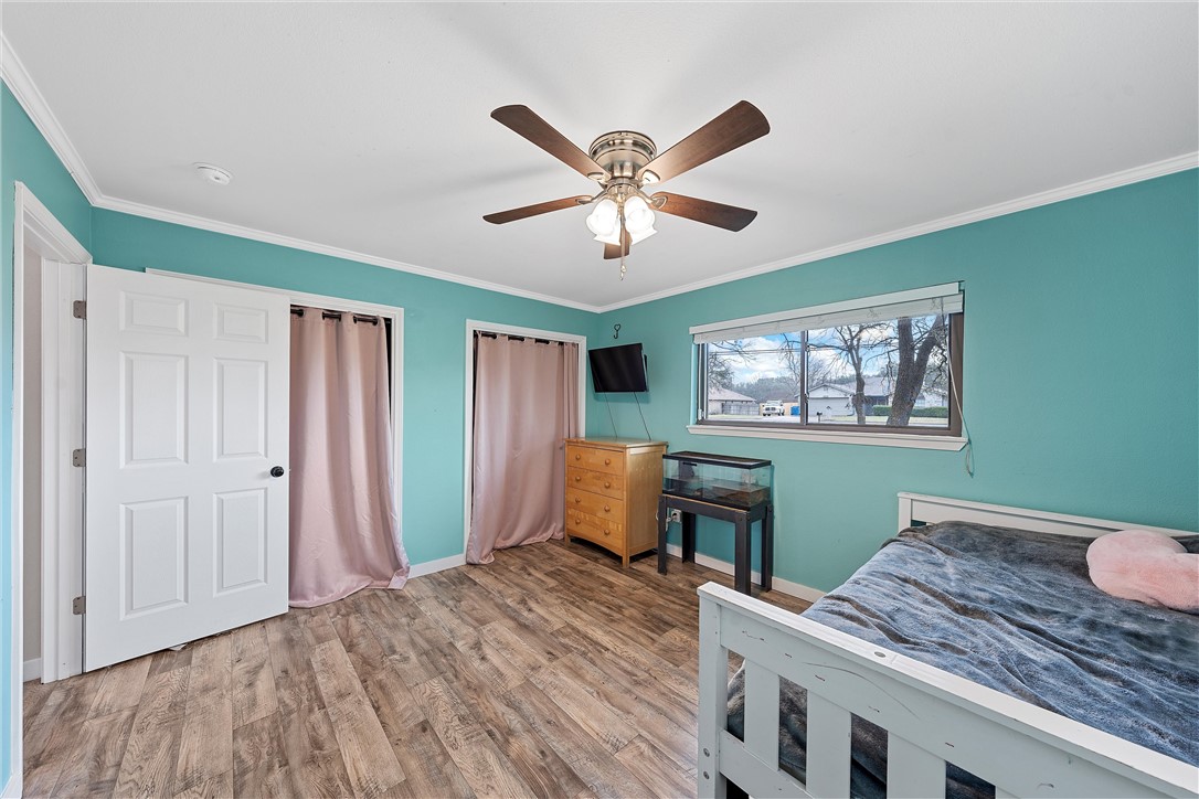 220 Ivy Lane Hewitt, TX 76643 - Photo 21 of 29 a bedroom with a bed and a table