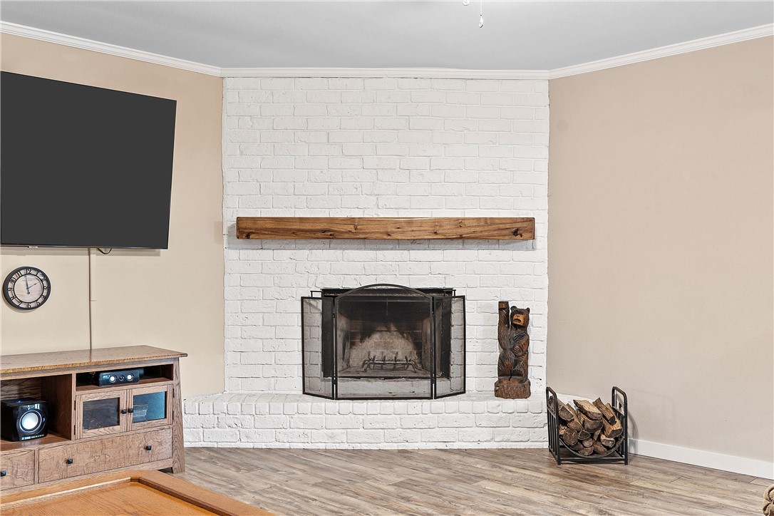 220 Ivy Lane Hewitt, TX 76643 - Photo 7 of 29 a living room with furniture and a fireplace