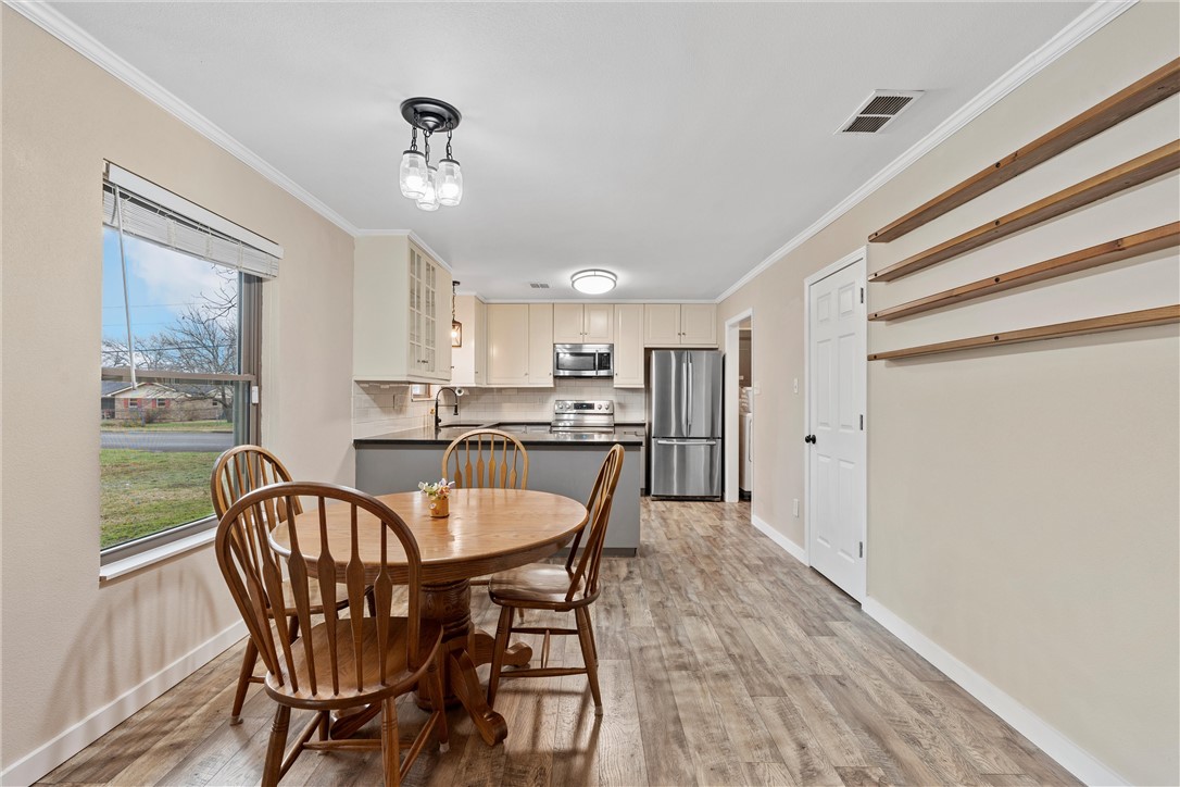 220 Ivy Lane Hewitt, TX 76643 - Photo 10 of 29 a dining room with furniture and window