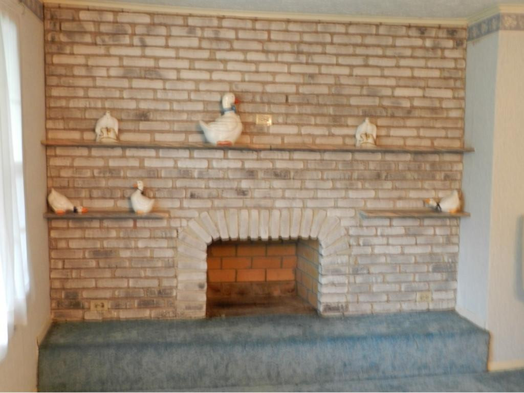 3180 Woolsey Road Greeneville, TN 37745 - Photo 4 of 18 Brick fireplace in Living room