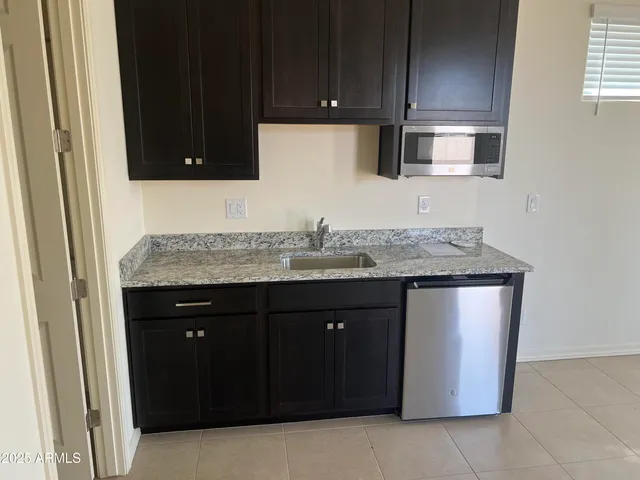 a bathroom with a sink and toilet