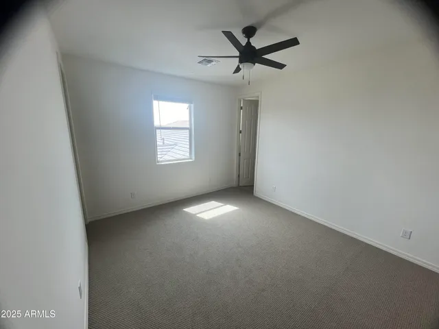 a view of an empty walk in closet