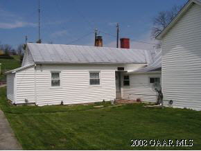 3733 Middlebrook Village Road Middlebrook, VA 24459 - Photo 2 of 5 a front view of a house with a garden