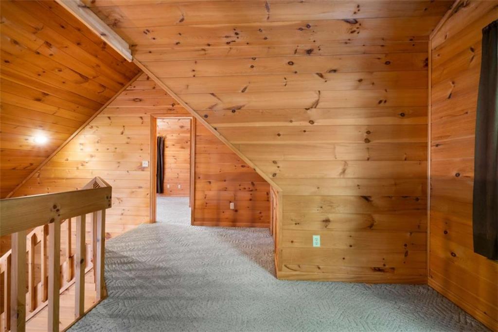 419 Blue Ridge Trail Morganton, GA 30560 - Photo 15 of 34 a view of a balcony with wooden fence
