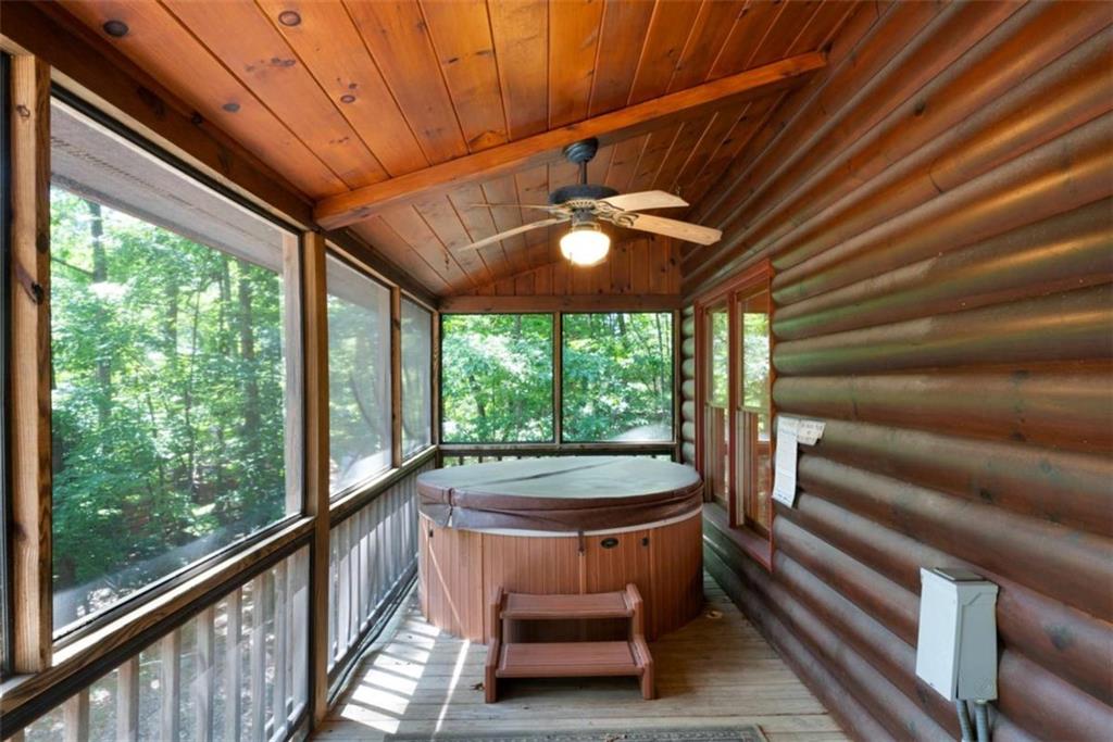 419 Blue Ridge Trail Morganton, GA 30560 - Photo 20 of 34 a balcony with furniture and a ceiling fan