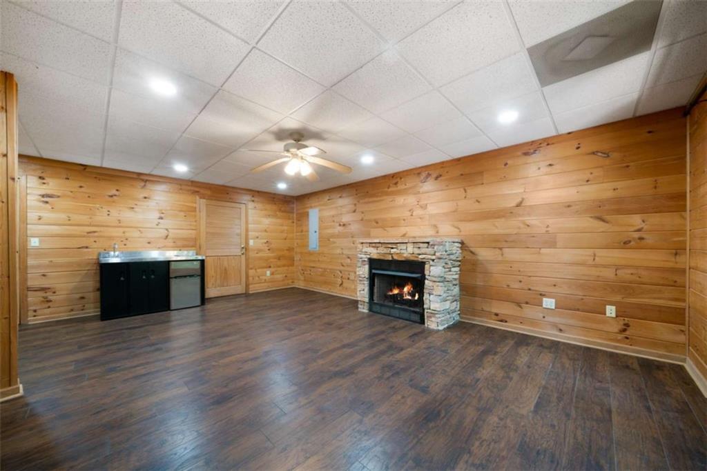 419 Blue Ridge Trail Morganton, GA 30560 - Photo 24 of 34 a view of kitchen with a sink and a fireplace