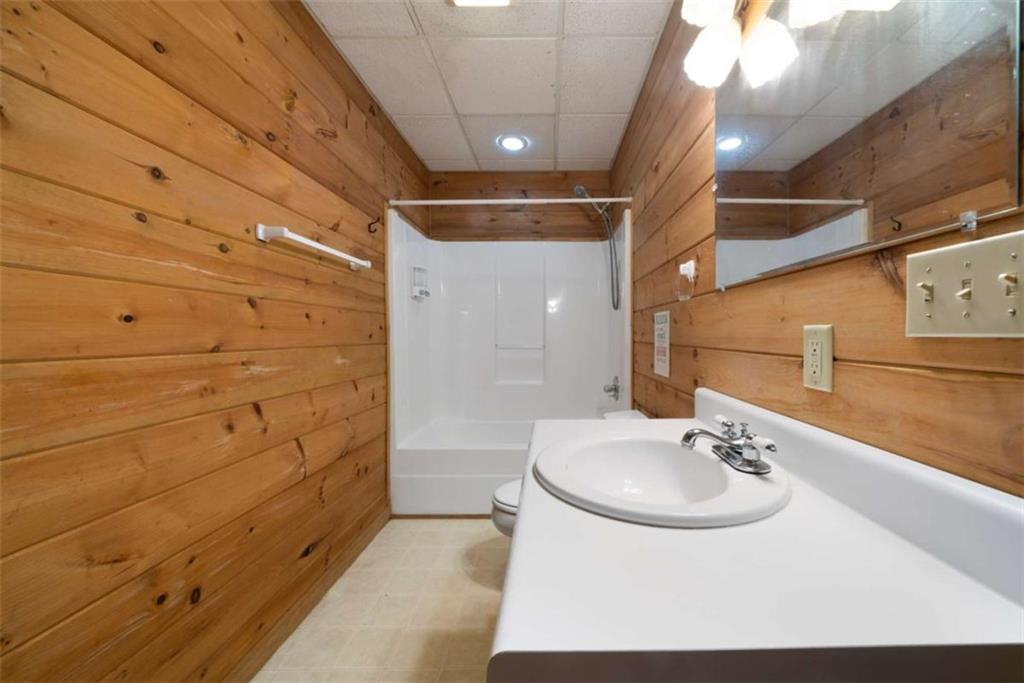419 Blue Ridge Trail Morganton, GA 30560 - Photo 29 of 34 a bathroom with a sink and a mirror