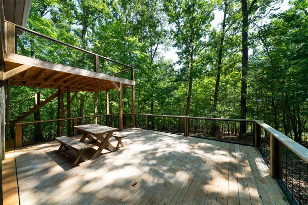 419 Blue Ridge Trail Morganton, GA 30560 - Photo 30 of 34 a view of sitting area with furniture and umbrella
