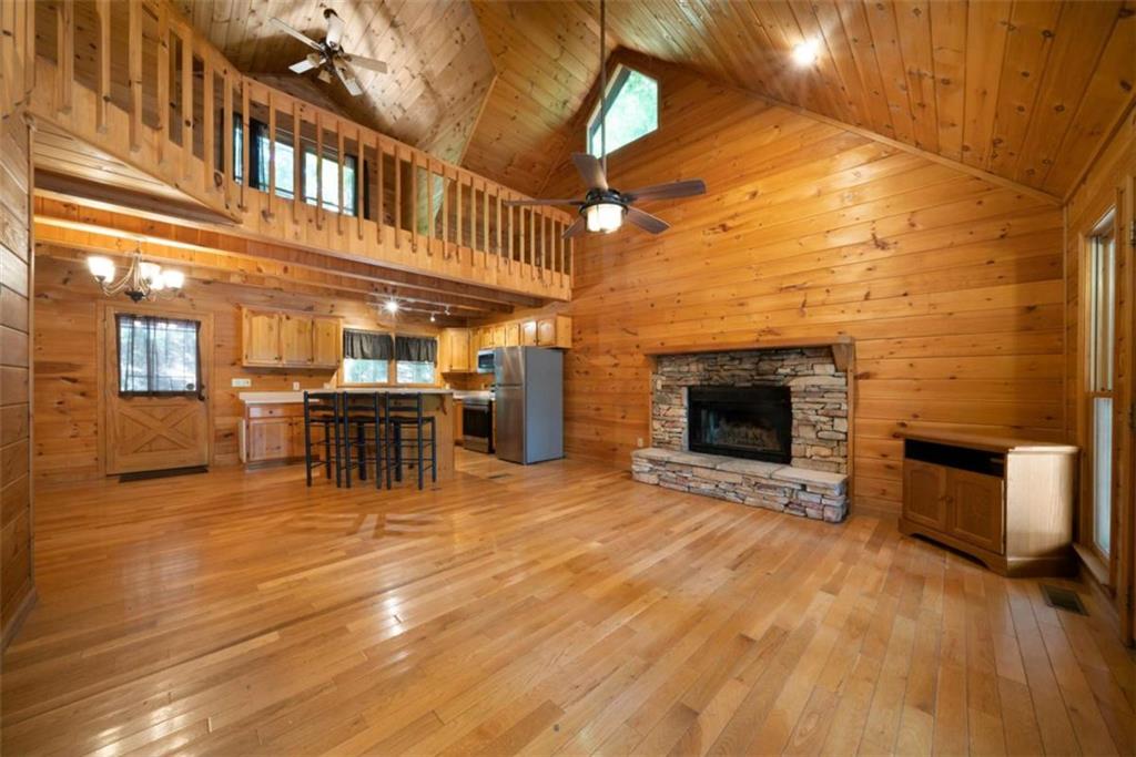 419 Blue Ridge Trail Morganton, GA 30560 - Photo 7 of 34 a view of a livingroom with furniture and fireplace
