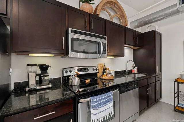 a close view of dining table and chairs