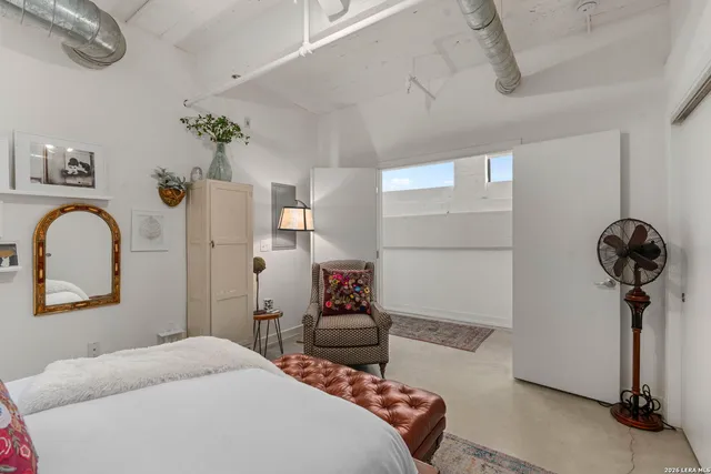 a view of a hallway with staircase