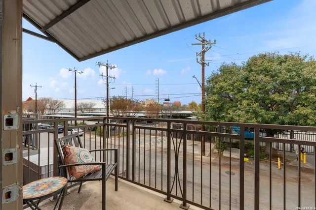 a blue sign that is on the side of the road