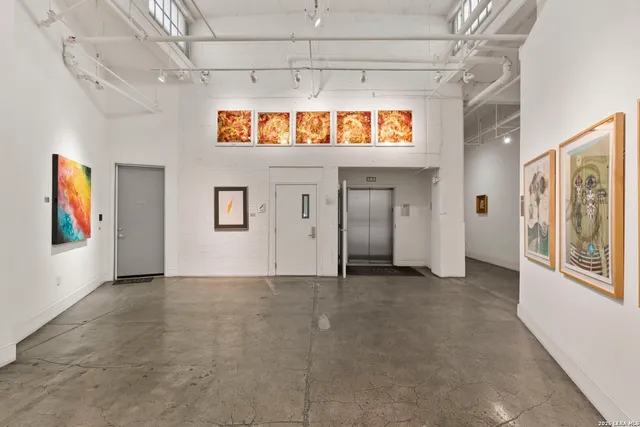 a view of a car in front of a house