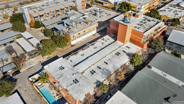 an aerial view of multi story residential apartment building