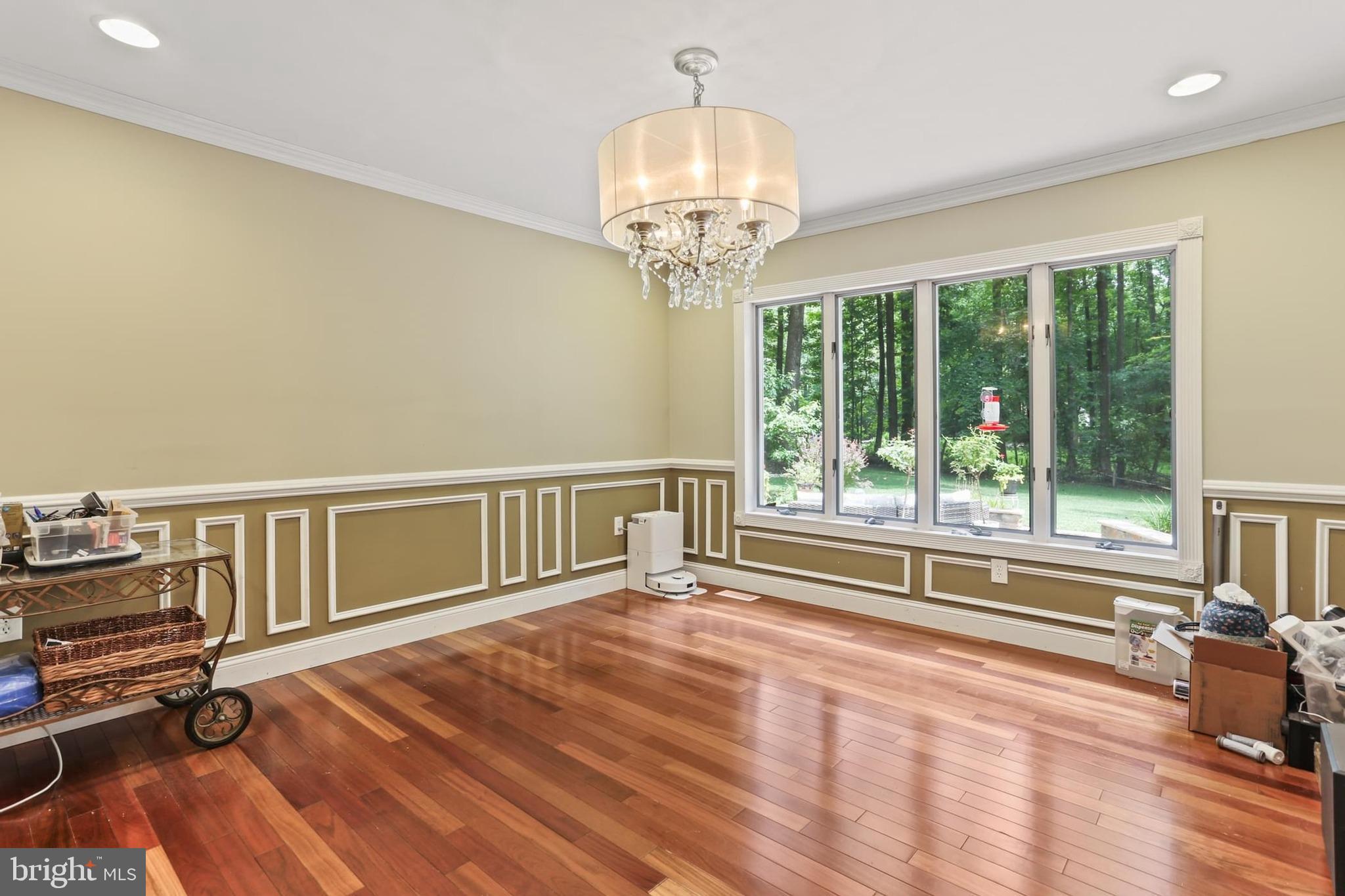 12803 Molly Berry Road Upper Marlboro, MD 20772 - Photo 13 of 61 a view of a room with wooden floor fan and windows