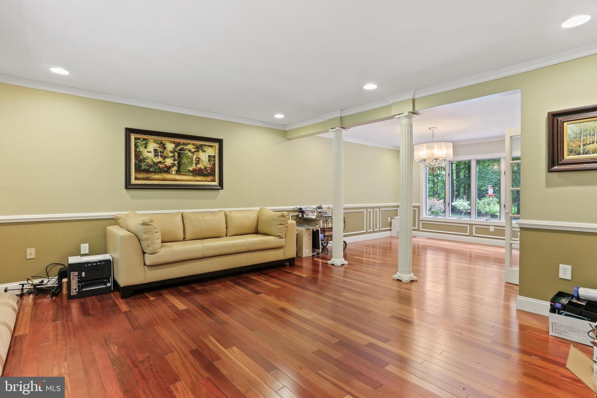 12803 Molly Berry Road Upper Marlboro, MD 20772 - Photo 15 of 61 a living room with furniture and a wooden floor