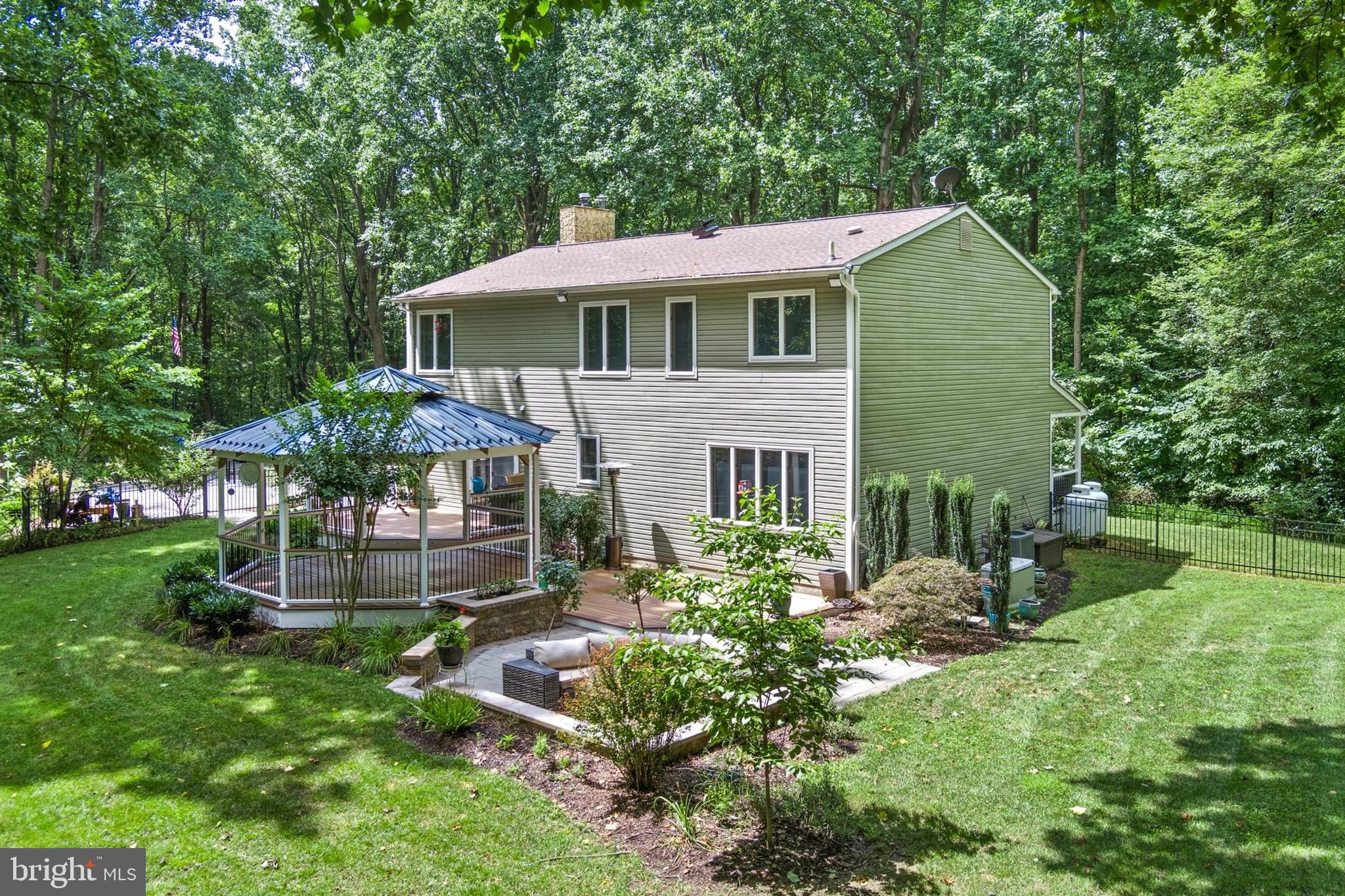 12803 Molly Berry Road Upper Marlboro, MD 20772 - Photo 3 of 61 a front view of a house with a yard