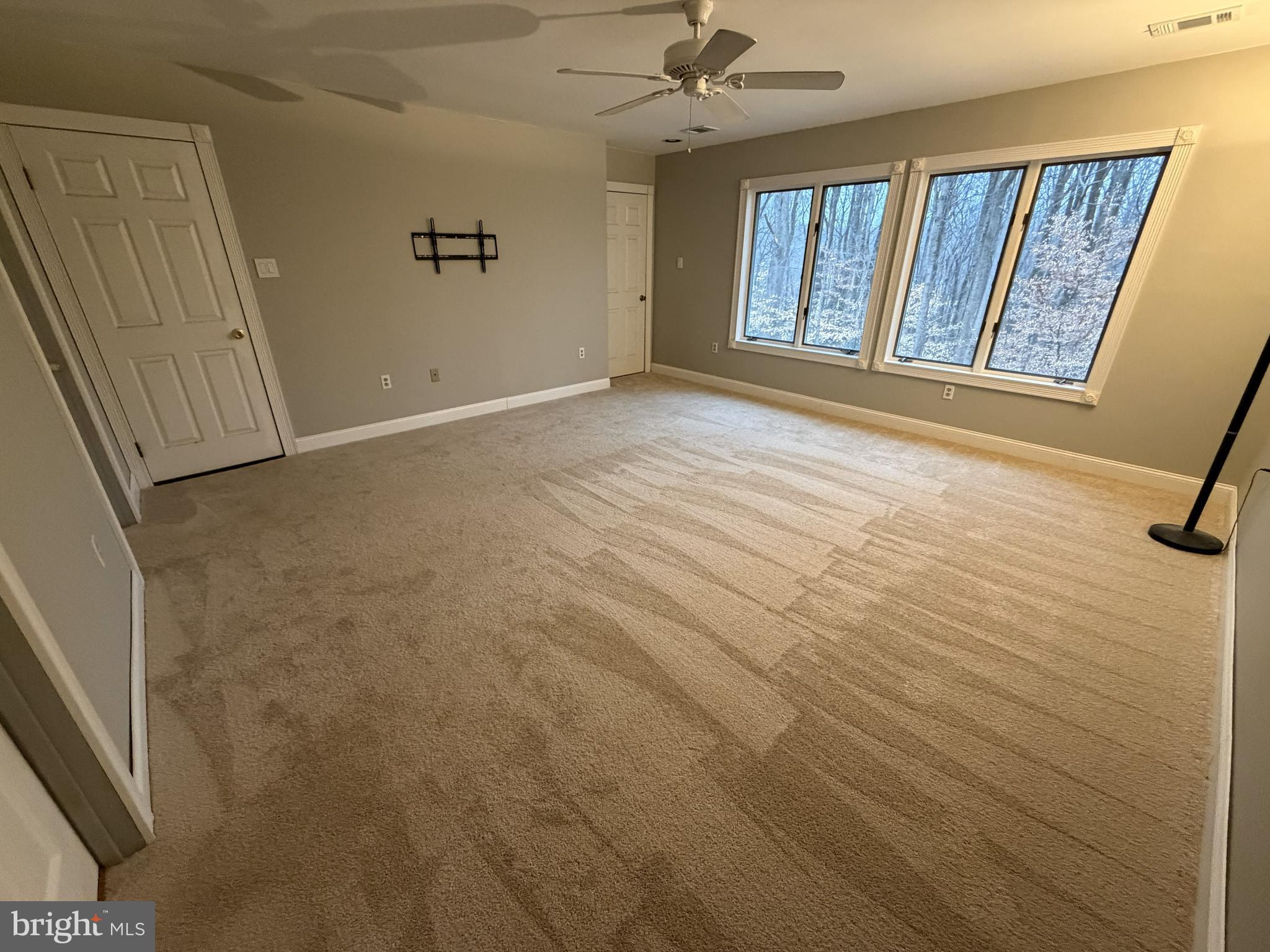12803 Molly Berry Road Upper Marlboro, MD 20772 - Photo 32 of 61 an empty room with windows