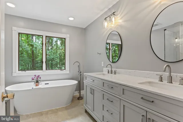a view of a livingroom with furniture and a flat screen tv