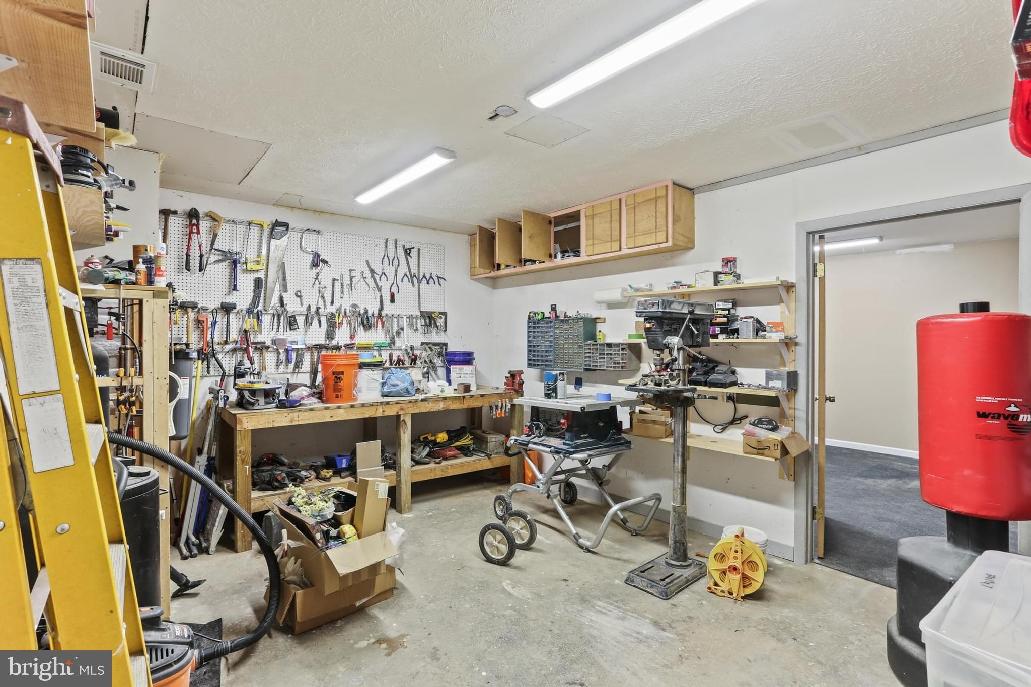 12803 Molly Berry Road Upper Marlboro, MD 20772 - Photo 48 of 61 a view of a room with gym equipment