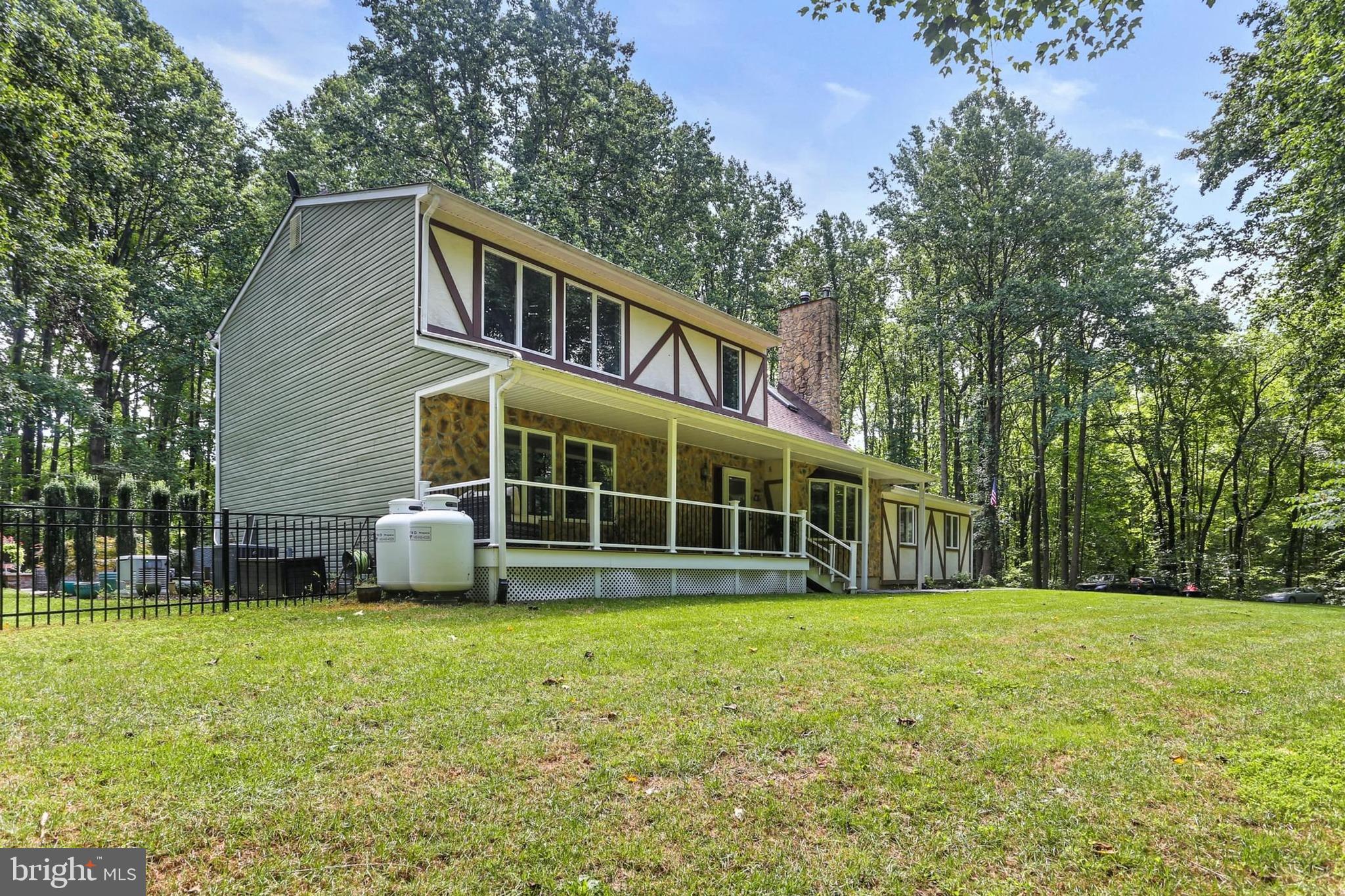 12803 Molly Berry Road Upper Marlboro, MD 20772 - Photo 6 of 61 a view of a house with yard and sitting area