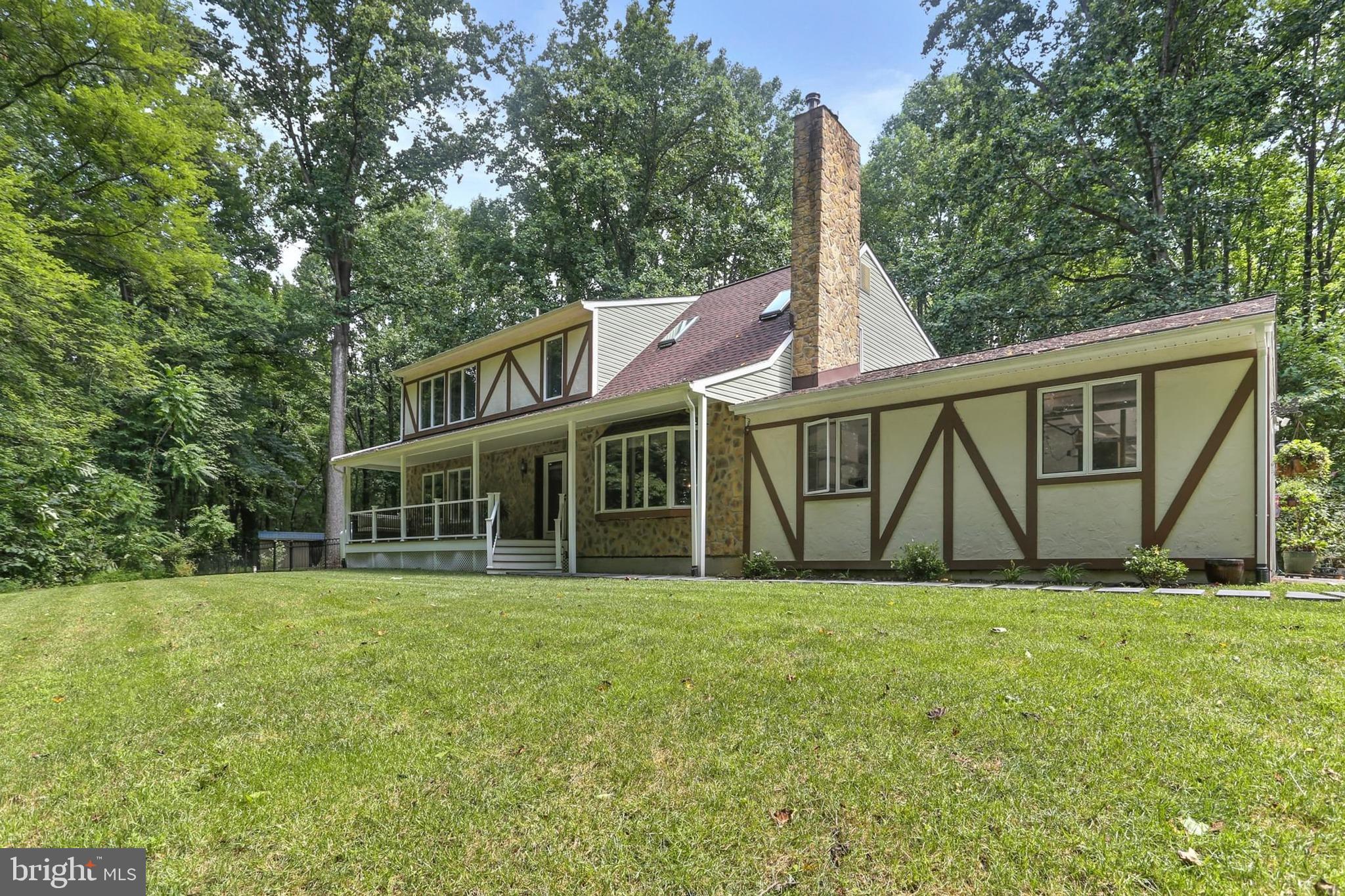 12803 Molly Berry Road Upper Marlboro, MD 20772 - Photo 7 of 61 a view of a house with yard and sitting area