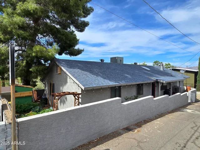 a house view with a outdoor space