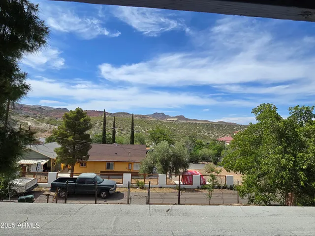 a view of a patio in backyard