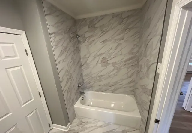 a bathroom with a bathtub