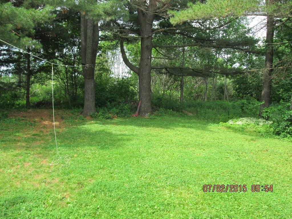 91 Crestmont Road Bangor, ME 04401 - Photo 4 of 30 Privacy buffer and backs up to golf...